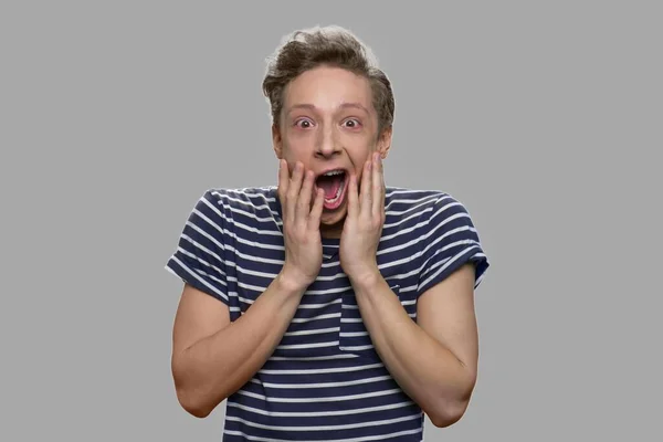 Happy stunned teen boy close up. — Stock Photo, Image