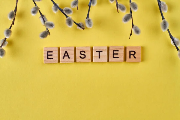 Easter word on yellow background. — Stock Photo, Image