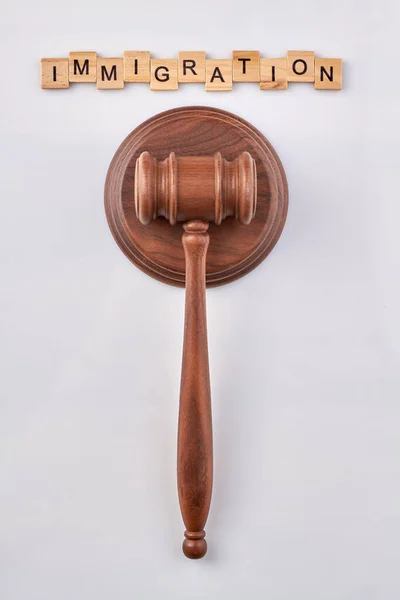 Wooden gavel and sounding block on white. — Stock Photo, Image