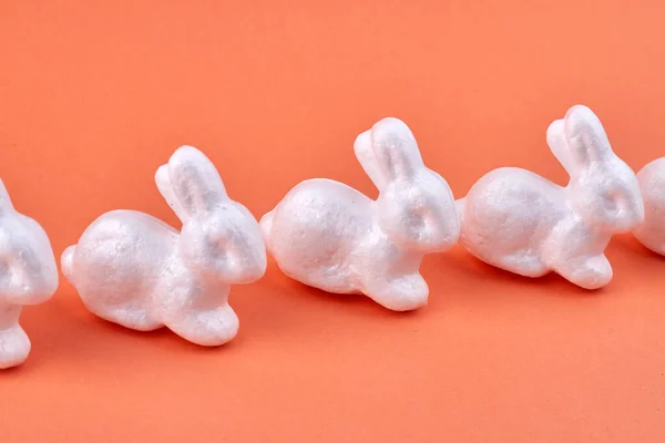 White miniautre decorative rabbits. Symbol of easter. — Stock Photo, Image