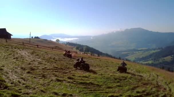 ATV quad bike driving in the countryside. — ストック動画