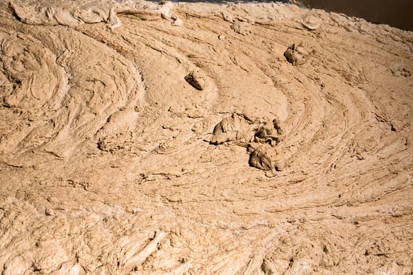 Dough kneading at bakery. Raw dough background. — Foto de Stock