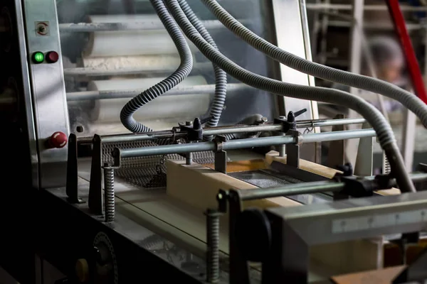 Close up of automated technology at confectionery factory. — Foto de Stock