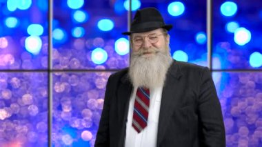 Senior businessman showing ok gesture.