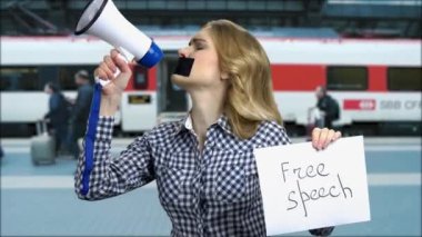 Free speech concept. People walking on railway train station platform.