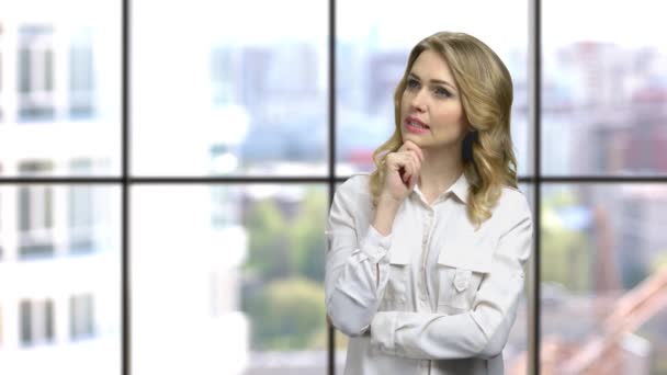 Portrait of attractive business woman with thoughtful expression. — Wideo stockowe