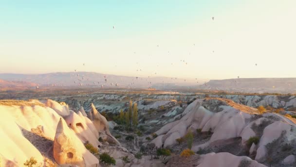 White rocks in Cappadocia valley at sunset. — Stock Video