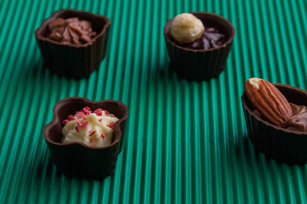 Sweet chocolate candies with various fillings close-up. — Fotografia de Stock