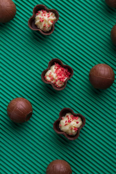 Vertical shot top view assorted brown chocolates. — стоковое фото