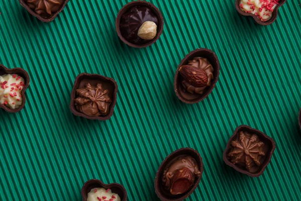 Top view flat lay various assorted chocolate candies. — стоковое фото