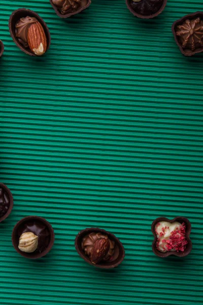 Vertical shot top view chocolate candies and copy space. — Fotografia de Stock