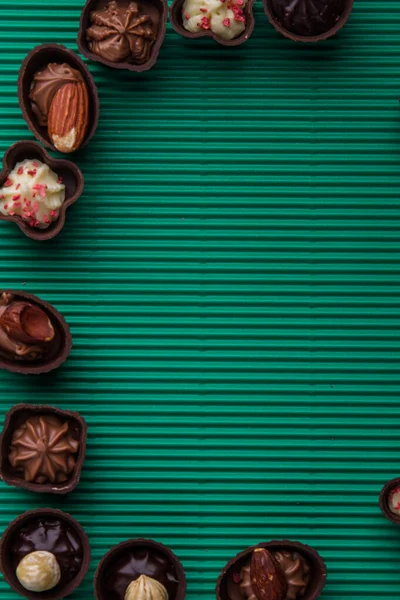 Vertical shot assorted chocolate candies and copy space. — Fotografia de Stock