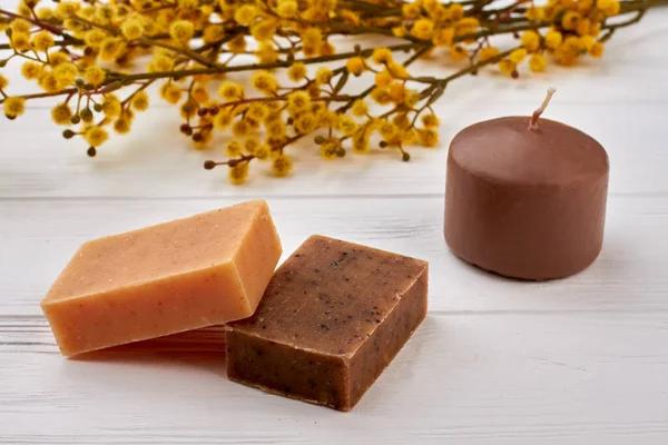 Brown spa soap bars and candle with pussy willow. — Stock Photo, Image