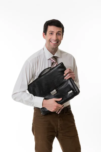 Un empleado sonriente con un maletín . — Foto de Stock