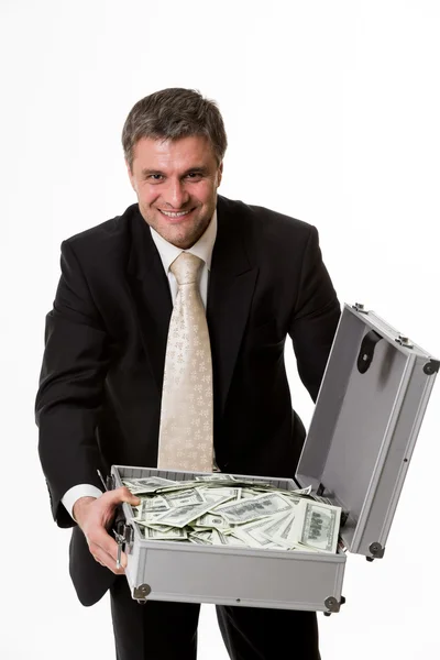 Man med resväska full av pengar. — Stockfoto