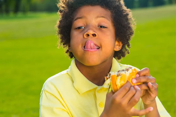 Nice boy has a breakfast. — Stock fotografie