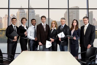 Team of businessmen in the business center.