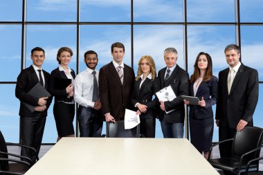 Business meeting in skyscraper.