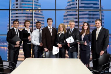 Group of businessmen on the background of skyscrapers.