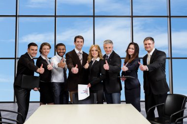 Ambitious business people signed a contract.