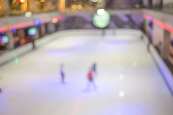 Blurred  people skating on the ice rink. — Stock Photo, Image