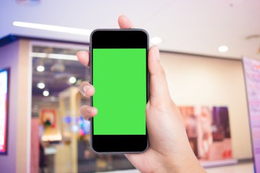 Fotoğraf boş. Kadın el boş mobil akıllı telefon tutarak