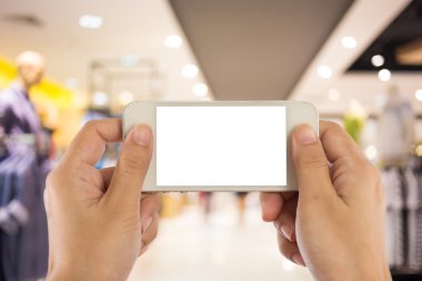 Fotoğraf boş. Kadın el boş mobil akıllı telefon tutarak