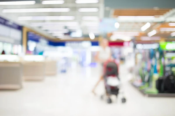 Imagem turva de shopping center e bokeh fundo — Fotografia de Stock