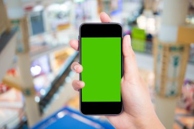 Fotoğraf boş. Elini tut boş kartvizit alışveriş merkezinde.