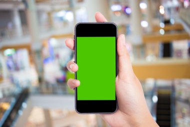 Fotoğraf boş. Kadın el boş mobil akıllı telefon tutarak