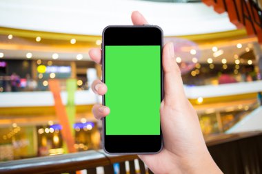 Alışveriş merkezinde mobil, akıllı telefon ile fotoğraf çekimi.