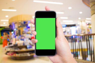 Alışveriş merkezinde bir akıllı telefon ile fotoğraf çekimi.