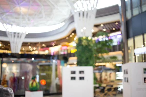 Imagen borrosa del centro comercial y el bokeh para el uso de fondo . — Foto de Stock