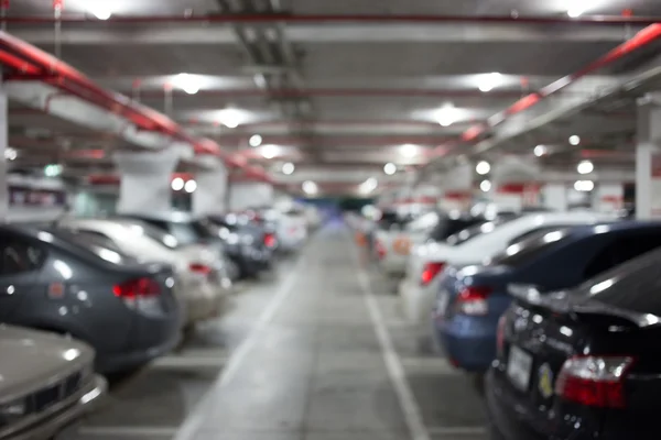 Подземная парковка с автомобилем — стоковое фото