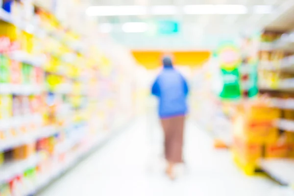 Imagem turva de shopping center e bokeh fundo — Fotografia de Stock