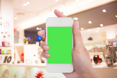 Fotoğraf boş. Alışveriş mal bir akıllı telefon ile fotoğraf çekimi