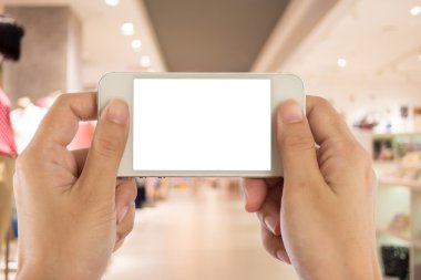 Fotoğraf boş. Alışveriş mal bir akıllı telefon ile fotoğraf çekimi