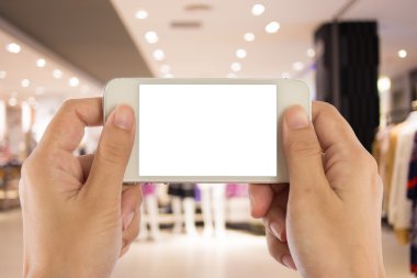 Fotoğraf boş. Alışveriş mal bir akıllı telefon ile fotoğraf çekimi