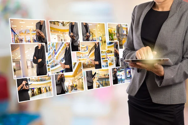 Mujer usando la tableta en el centro comercial . —  Fotos de Stock