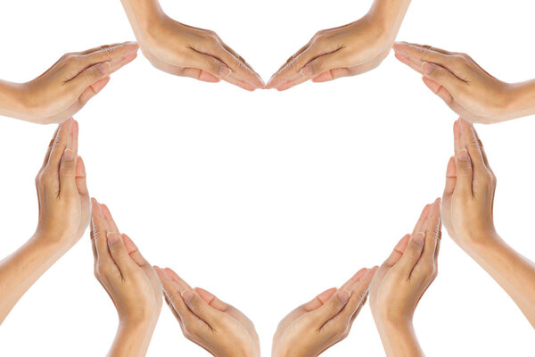 Hands make heart shape on white background