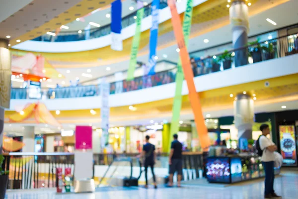 Imagem turva de shopping center e bokeh fundo — Fotografia de Stock