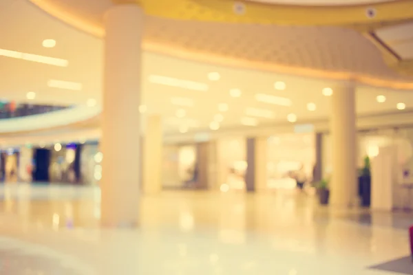 Imagem desfocada do shopping center e fundo bokeh: Vintage fi — Fotografia de Stock