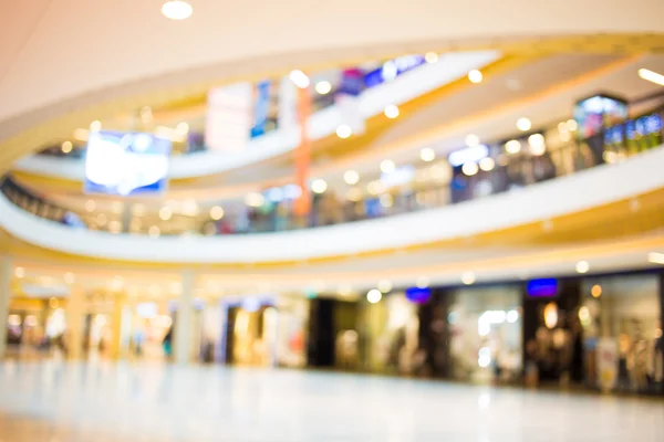 Imagem turva de shopping center e bokeh fundo — Fotografia de Stock