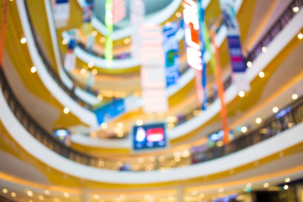 Imagem turva de shopping center e bokeh fundo — Fotografia de Stock