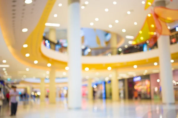 Imagem turva de shopping center e bokeh fundo — Fotografia de Stock