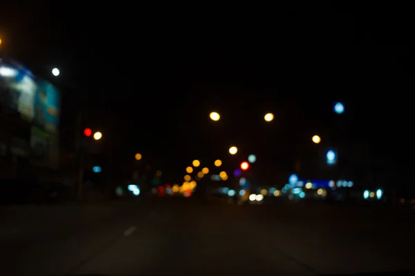 Ciudad noche luz borrosa bokeh, bokeh fondo . — Foto de Stock