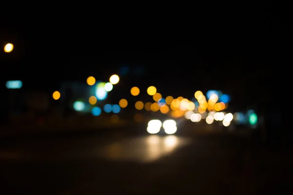 Cidade noite luz borrão bokeh, fundo bokeh . — Fotografia de Stock