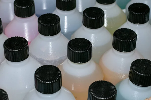 Multi Colored chemicals , ingredients for hand sanitisers and cleaning products ready for shipping