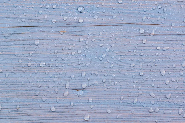 stock image Colored wood fencing background with rain water droplets, wet, horizontal.