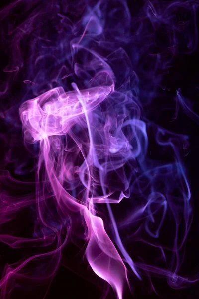 Multicolor Smoke Malerei auf schwarzem Hintergrund. Abstrakt. Stockbild